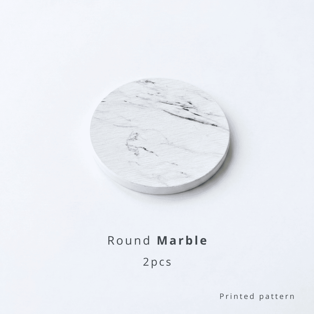 Round marble coaster on a White background