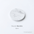 Round marble coaster on a White background