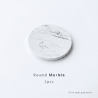 Round marble coaster on a White background