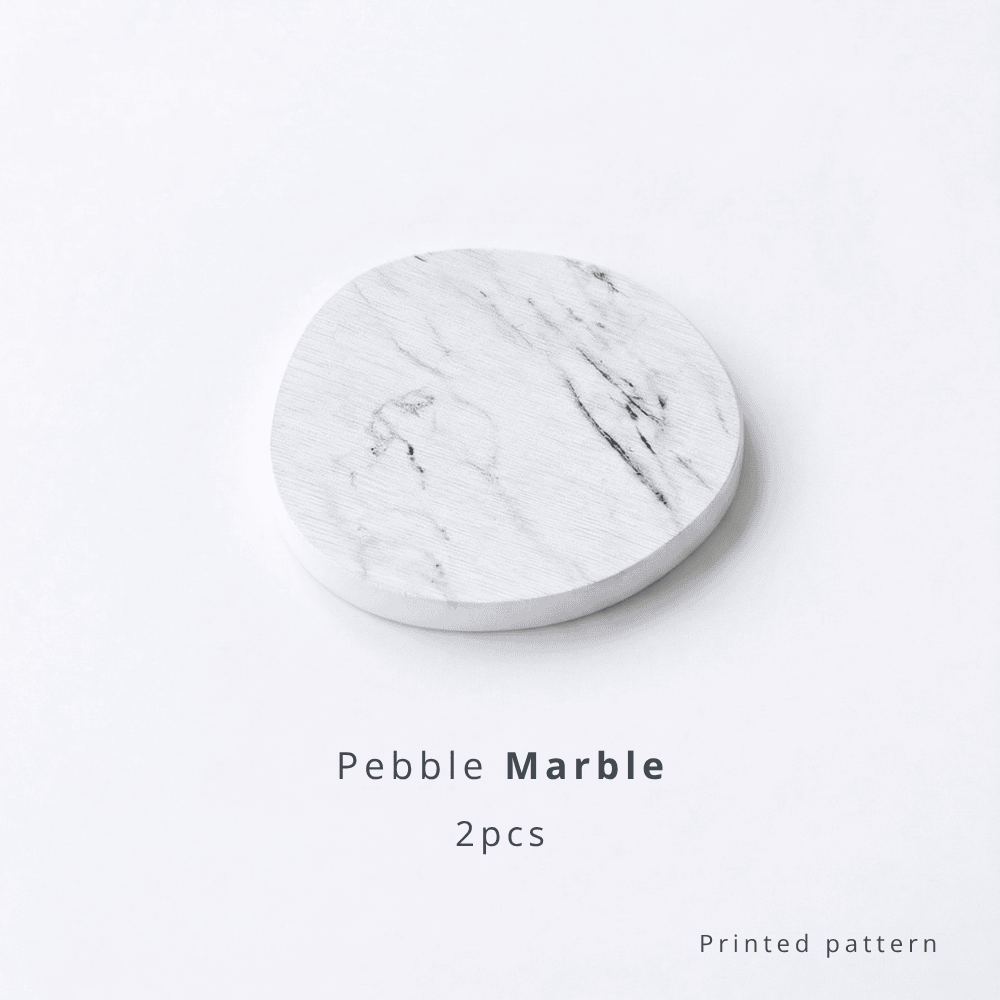 Pebble-shaped diatomite coaster with marble pattern on a white background with text 'Pebble Marble 2pcs printed pattern'