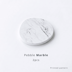 Pebble-shaped diatomite coaster with marble pattern on a white background with text 'Pebble Marble 2pcs printed pattern'