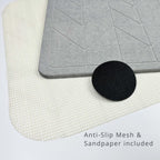 Grey textured diatomite stone mat on an anti-slip mesh, and sandpaper with text 'Anti-Slip Mesh & Sandpaper included'.