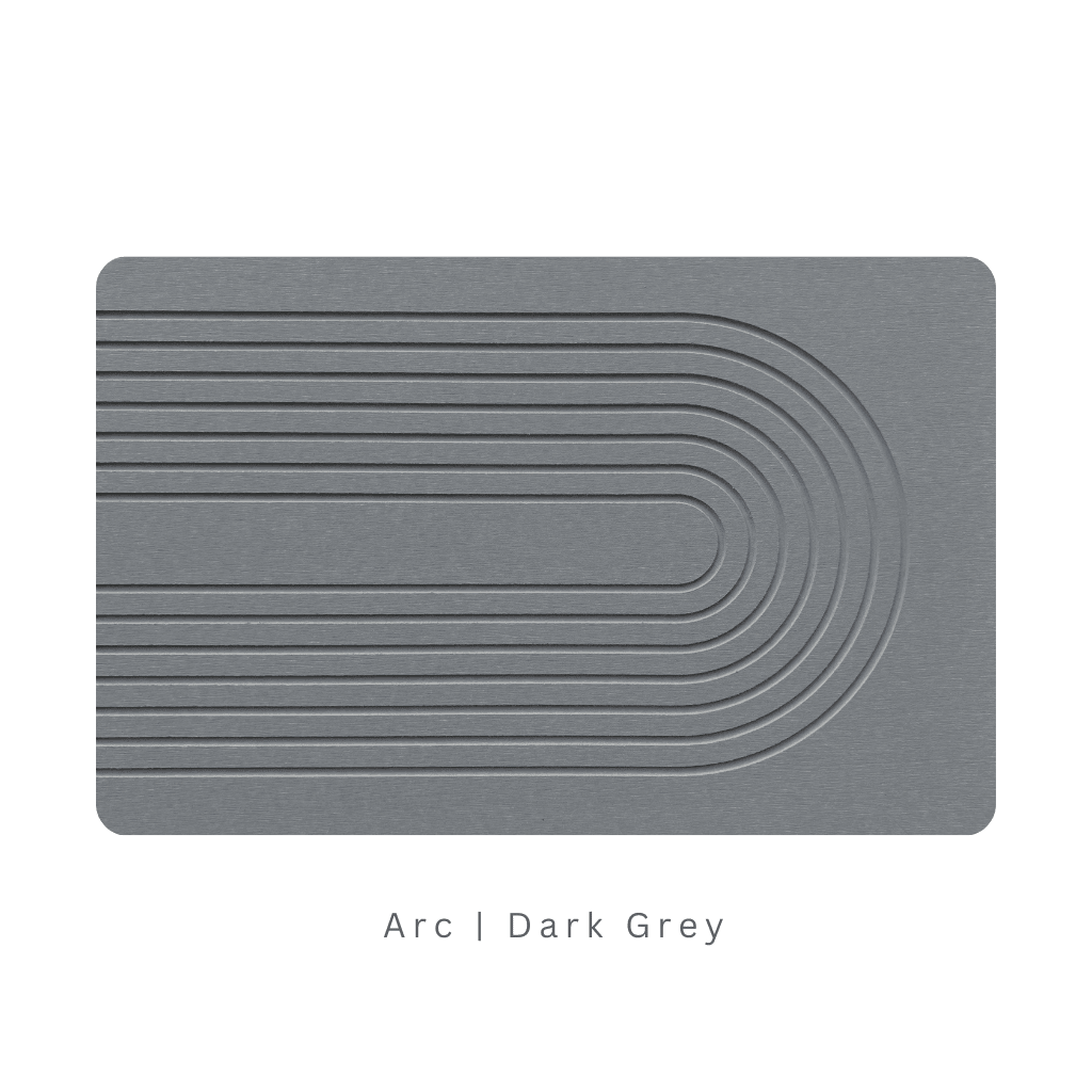 Dark Grey diatomite bath mat with a arc-shaped engraving on white background with text 'Arc Dark Grey'