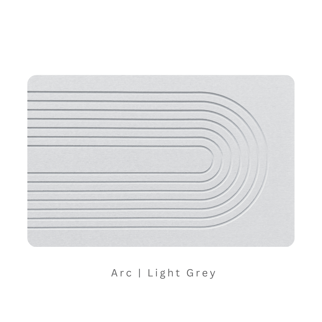 Light Grey diatomite bath mat with a arc-shaped engraving on white background with text 'Arc Light Grey'